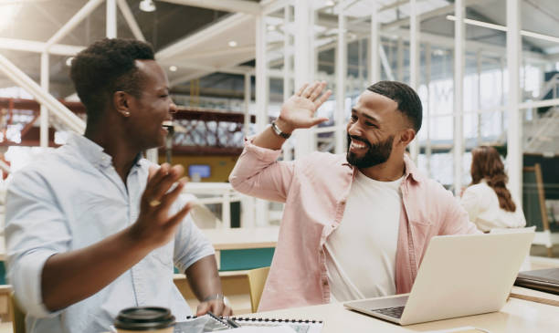 Business men, high five and partnership at startup for success, collaboration or happy at web design job. Man, winner friends and congratulations with motivation, synergy or teamwork in modern office